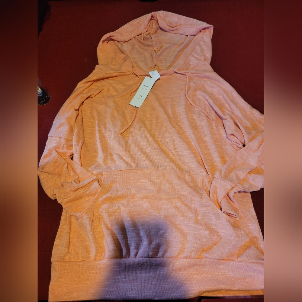 Pink/peach hooded top with pocket
